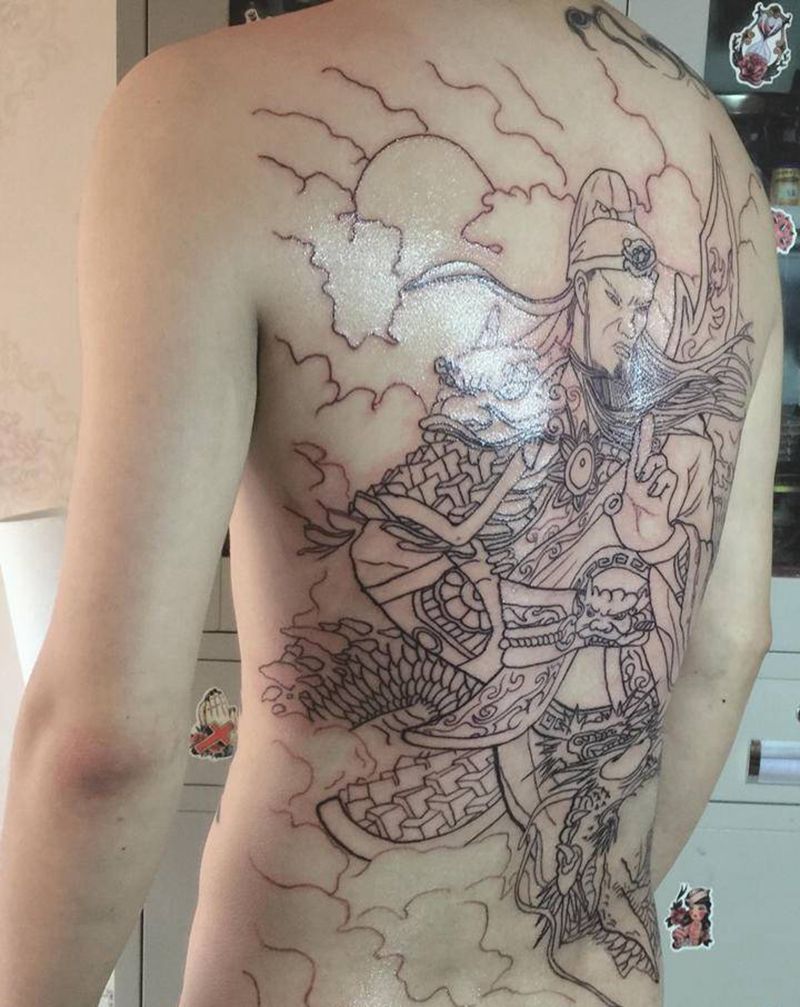 关公踏龙纹身图片_背部新传统纹身图案