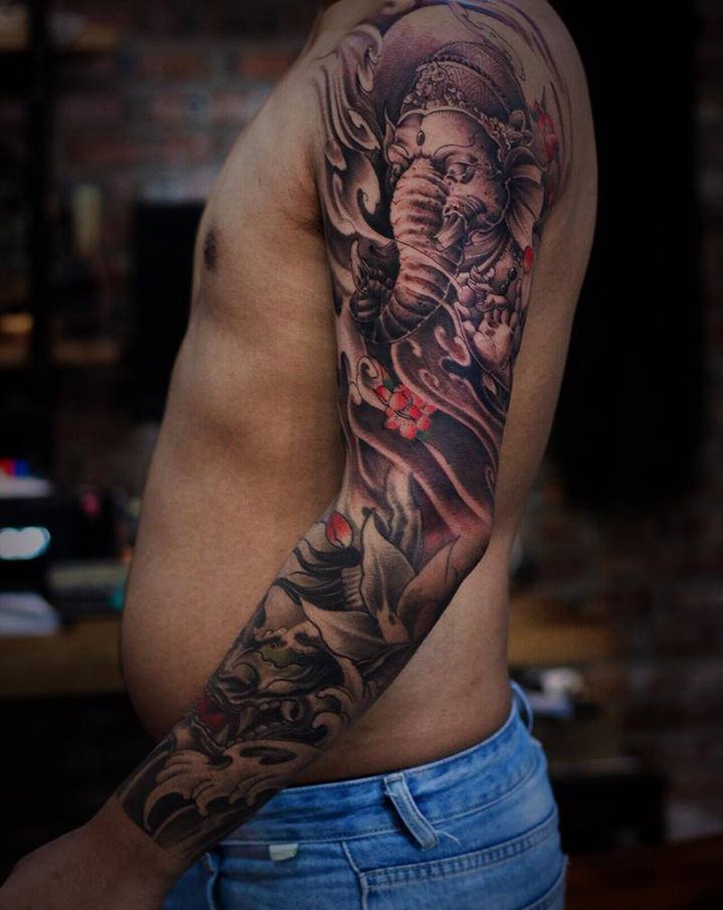 象神纹身图片_手臂新传统象神班若花臂纹身图案