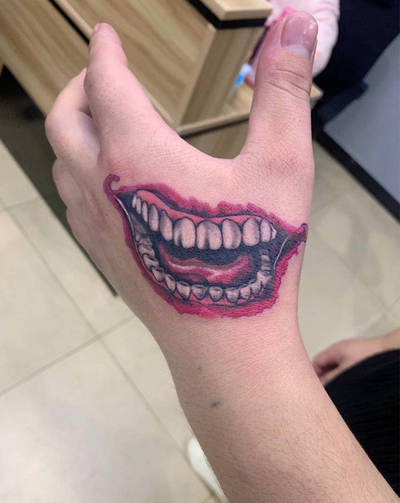 小丑纹身图片_手部纹身图案