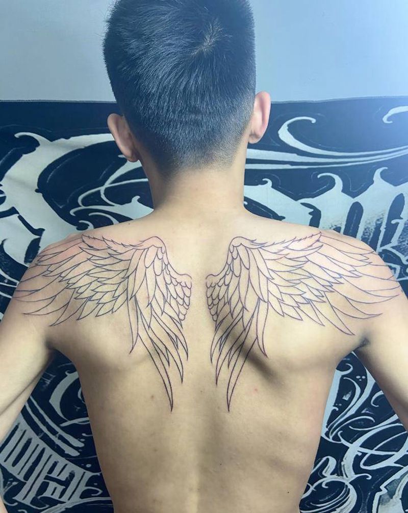 翅膀线纹身图片_背部新传统纹身图案