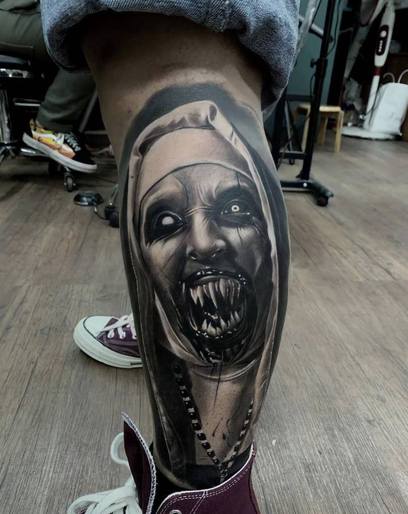 鬼修女纹身图片_腿部欧美写实纹身图案