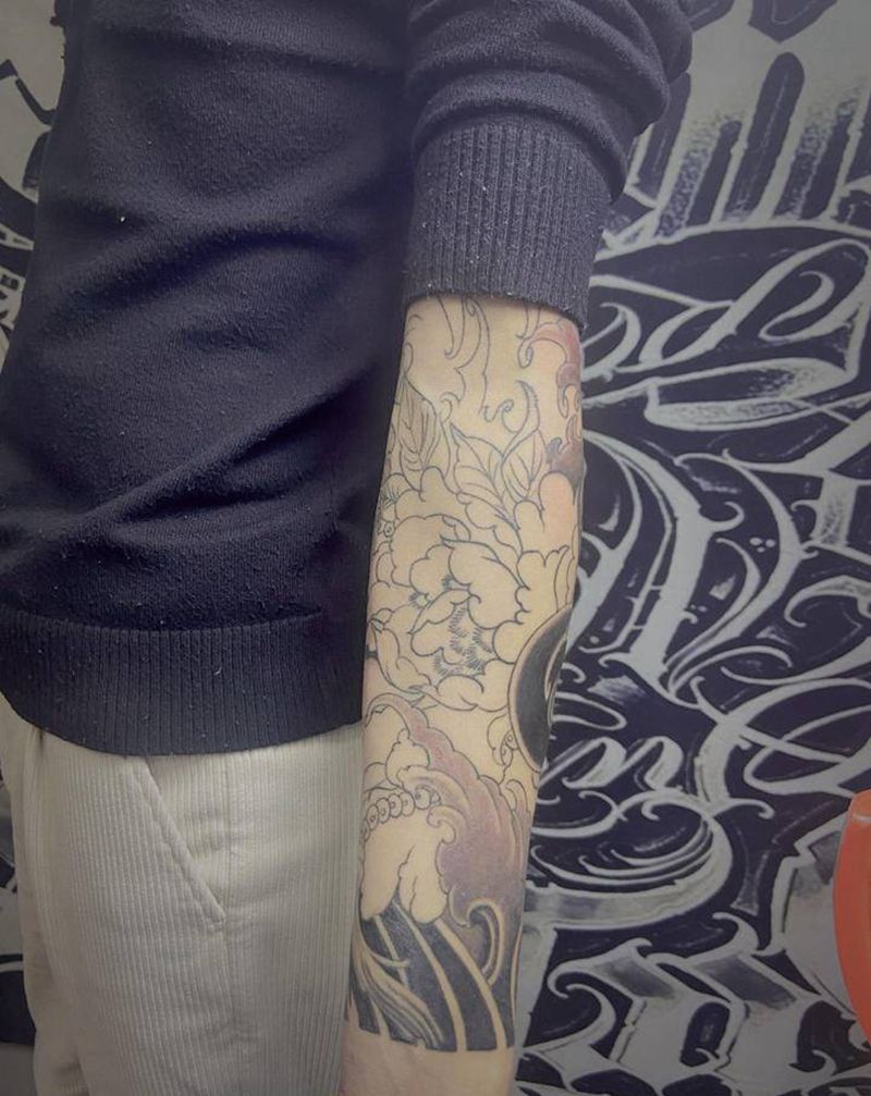 花臂未完纹身图片_手臂新传统纹身图案