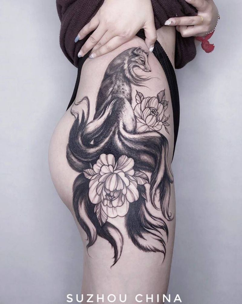 九尾狐纹身图片_腿部纹身图案