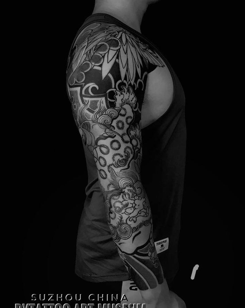 老传统唐狮花臂纹身图片_手臂老传统纹身图案