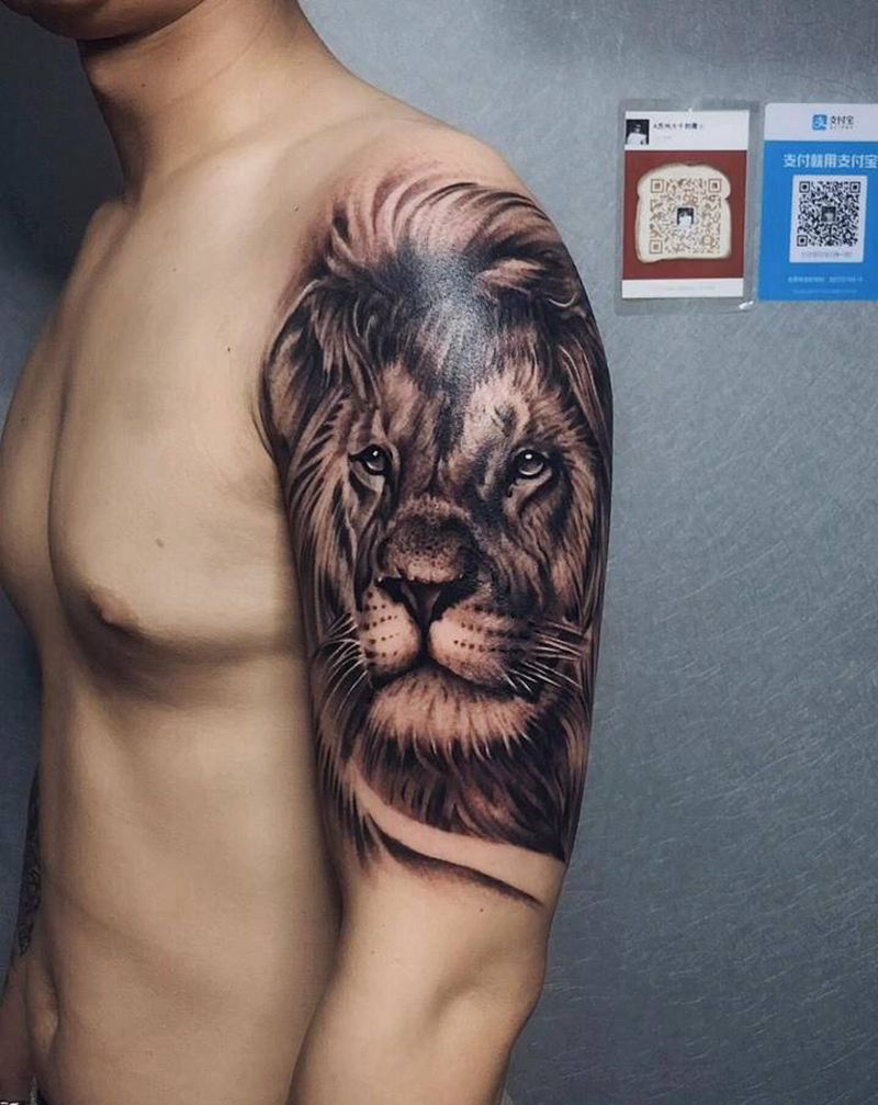 狮子纹身图片_手臂纹身图案