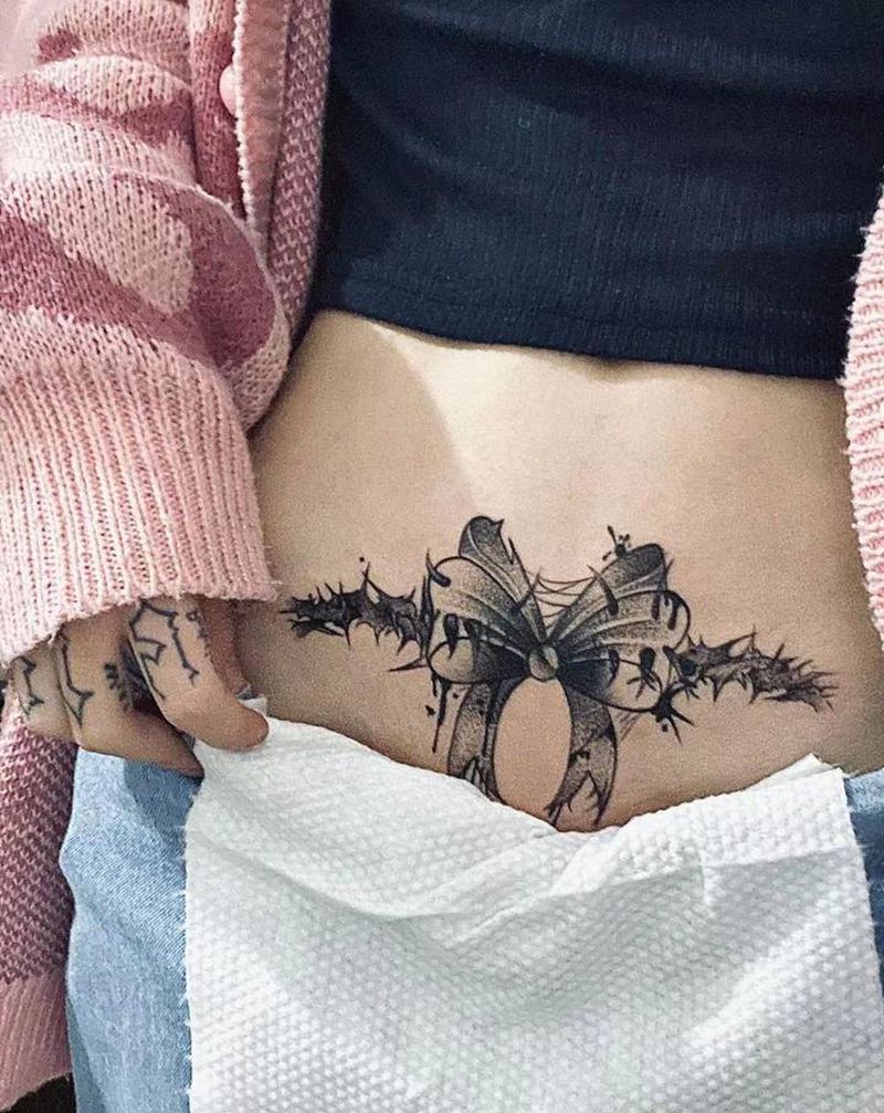 蝴蝶结 （甩针遮盖）纹身图片_腹部点刺纹身图案