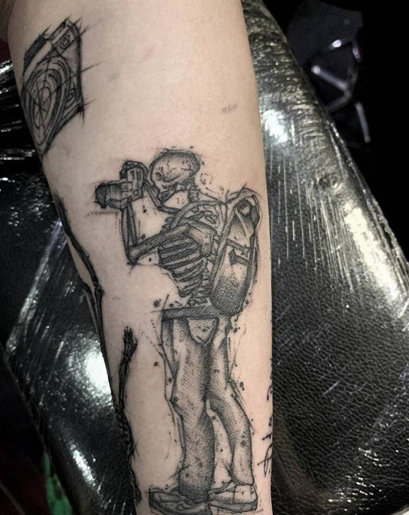 摄影纹身图片_手臂点刺纹身图案