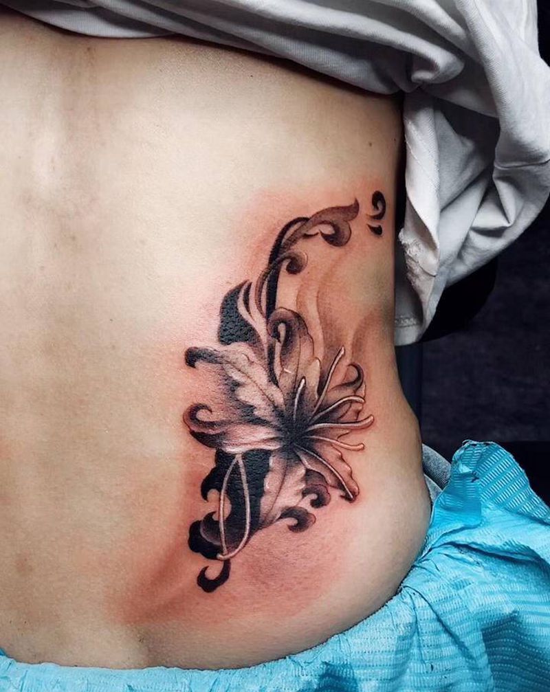 彼岸花纹身图片_腰部新传统纹身图案