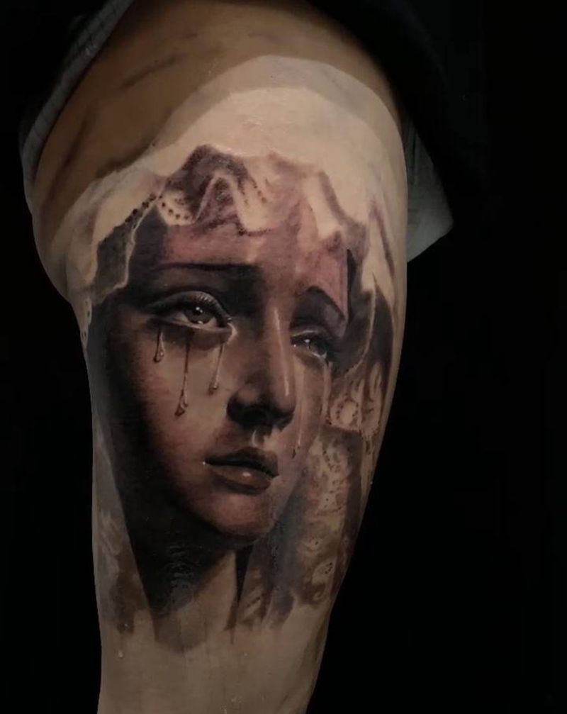 圣母未完成纹身图片_腿部欧美写实纹身图案