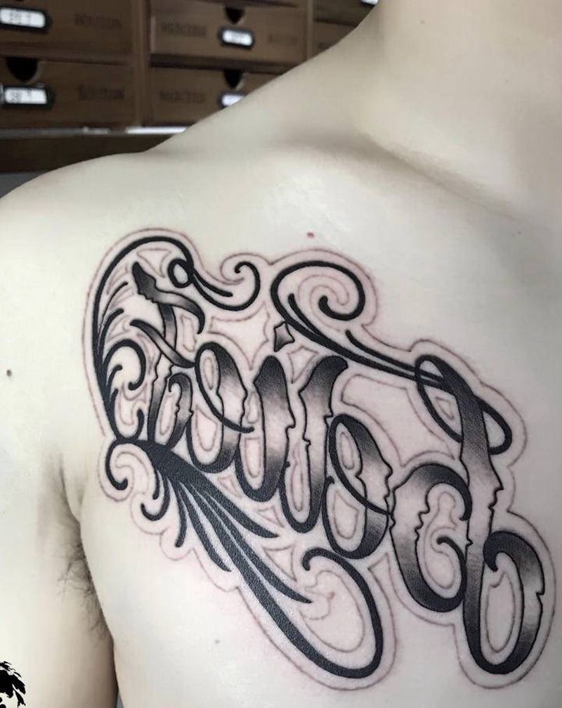 花体纹身图片_胸部花体字纹身图案
