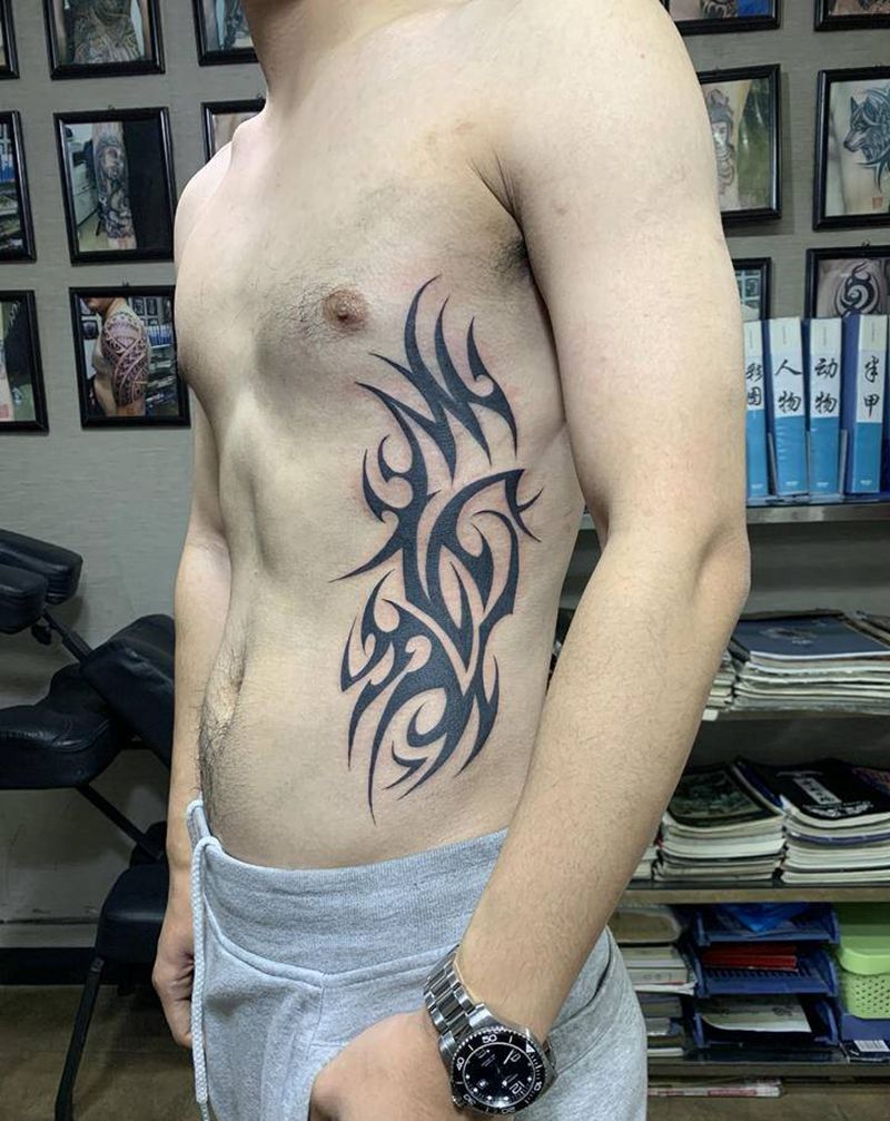 侧腰图腾纹身图片_腰部图腾纹身图案