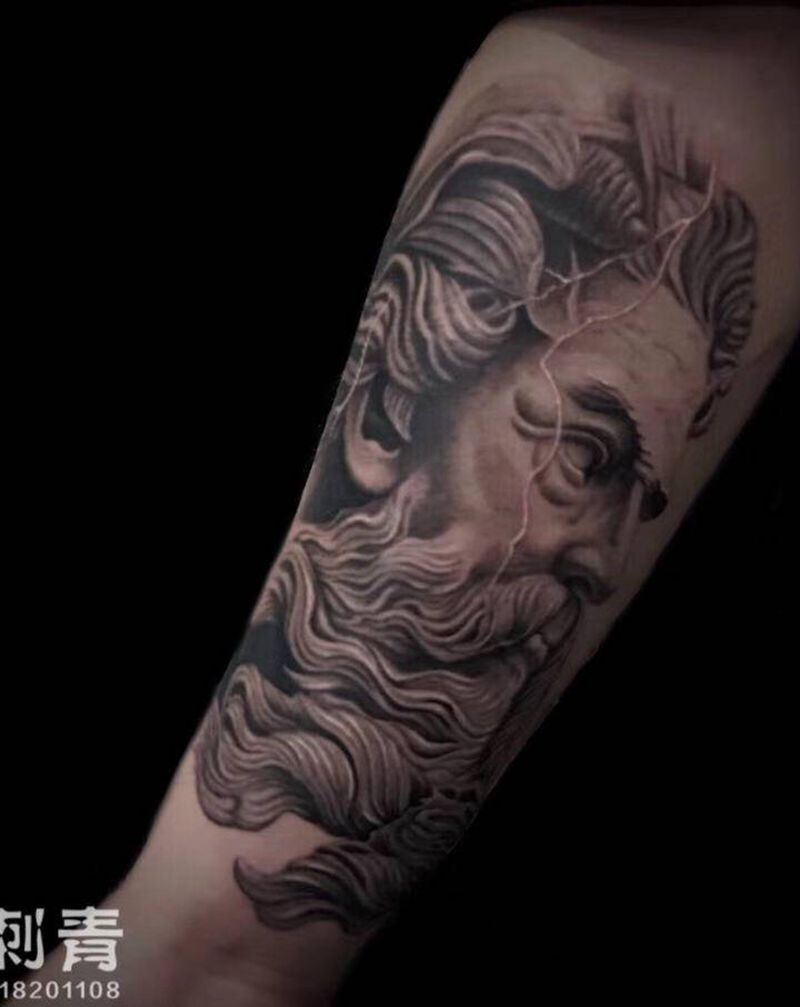 波赛冬纹身图片_手臂欧美写实纹身图案