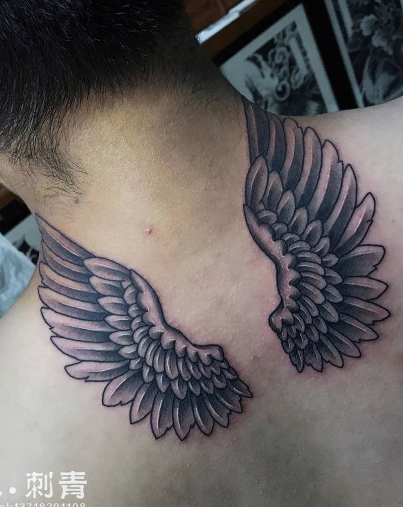 翅膀纹身图片_颈部纹身图案