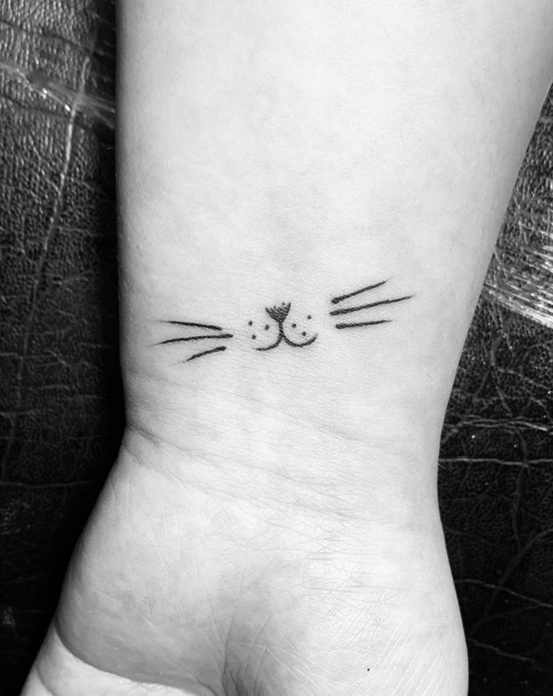 小猫纹身纹身图片_手部腿部几何小猫纹身图案