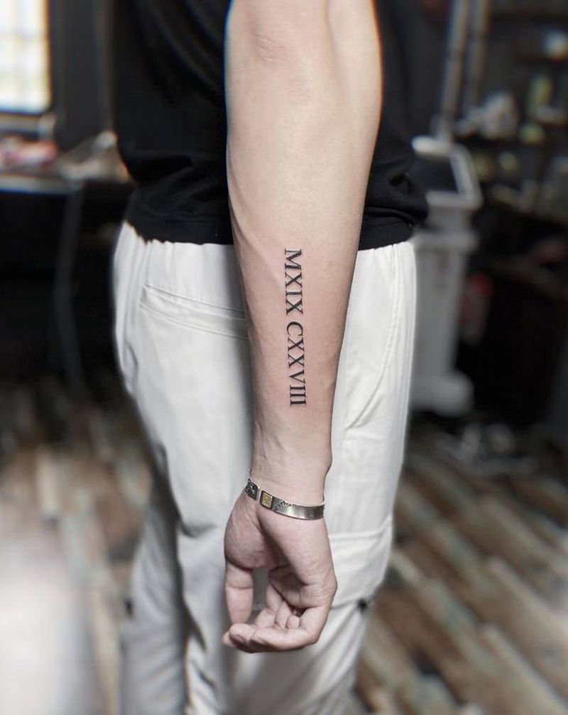 手臂花体字纹身纹身图片_手臂花体字纹身图案