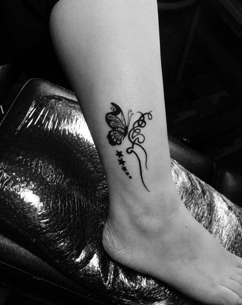 蝴蝶纹身图片_腿部图腾几何蝴蝶纹身图案