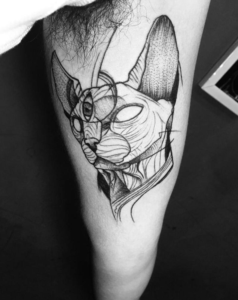 猫纹身图片_手臂点刺猫纹身图案