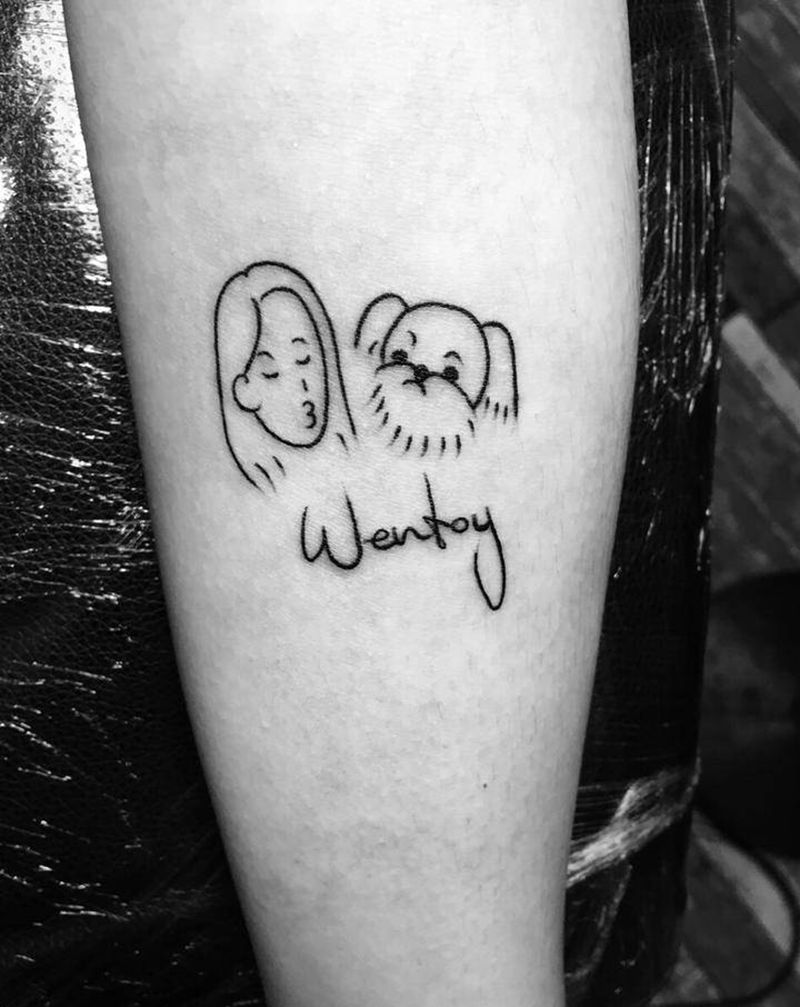 女孩小狗纹身图片_手臂几何女孩小狗纹身图案