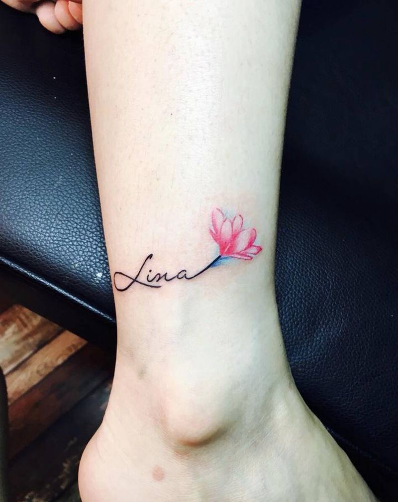 字母花纹身图片_腿部水彩水墨字母花纹身图案