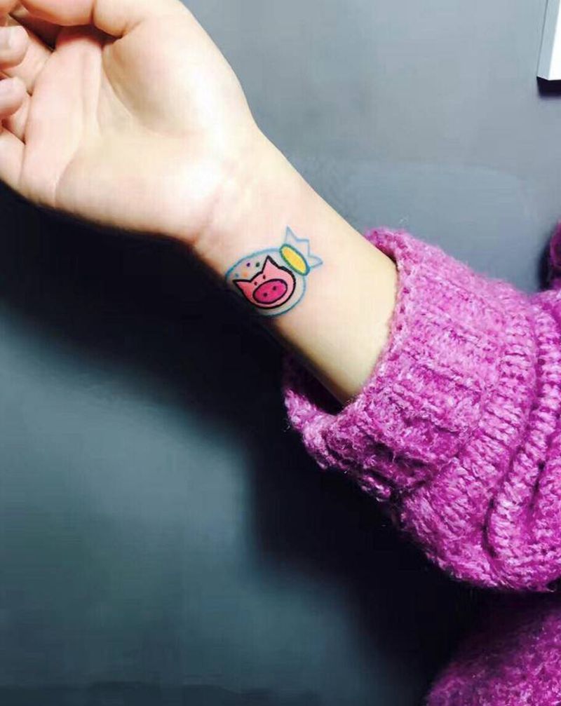 糖果猪纹身图片_手臂New SchoolOld School糖果猪纹身图案