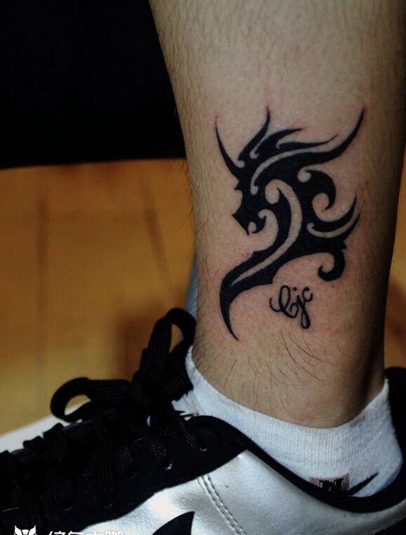 图腾龙纹身图片_手臂图腾图腾龙纹身图案