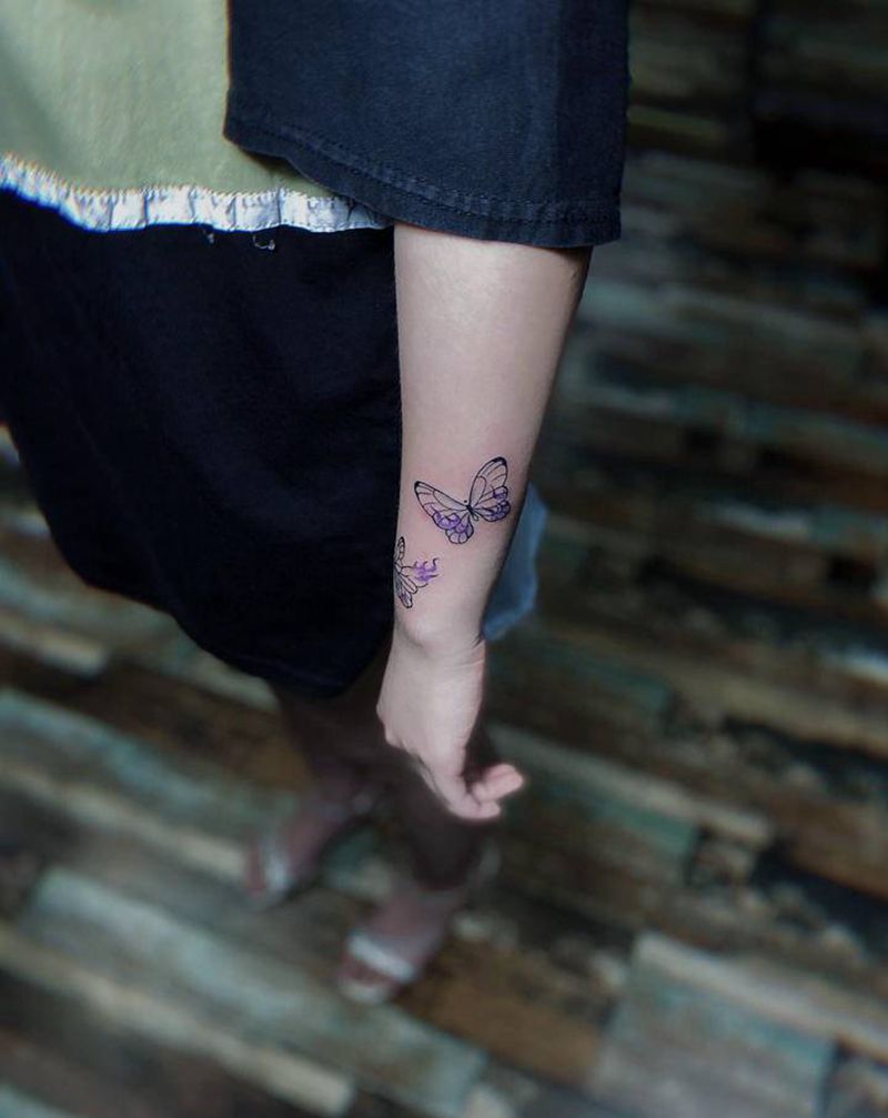 蝴蝶纹身纹身图片_手臂Old SchoolNew School蝴蝶纹身图案