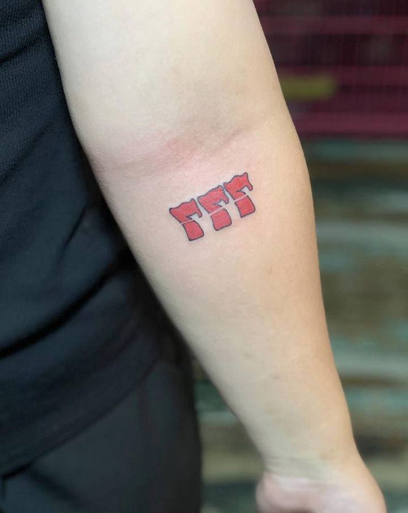 777纹身图片_手臂777纹身图案