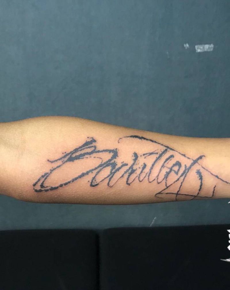 花体字纹身图片_手臂花体字纹身图案