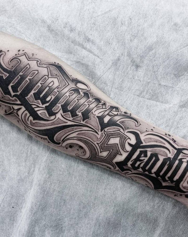 花体字纹身图片_手臂花体字纹身图案