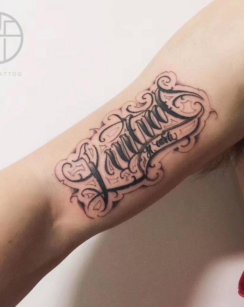 花体字作品纹身图片_手臂花体字纹身图案