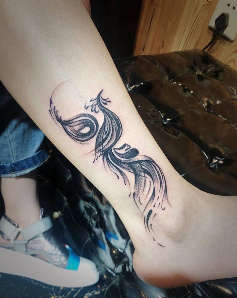 凤凰纹身纹身图片_手臂腿部点刺纹身图案