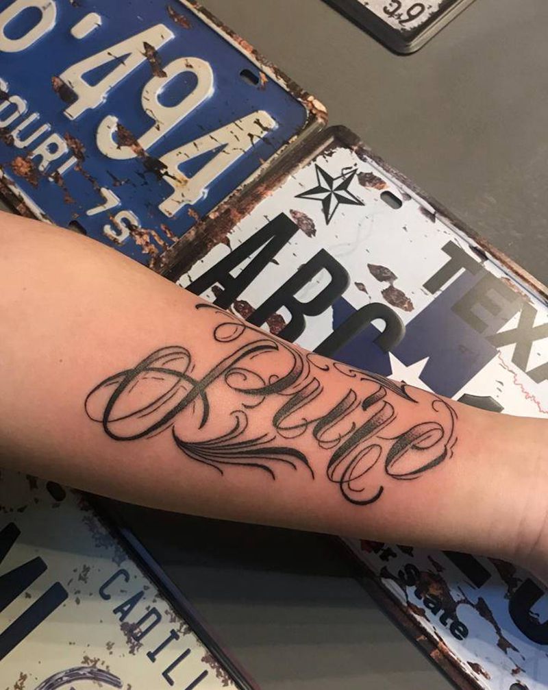 其卡诺纹身图片_花体字纹身图案