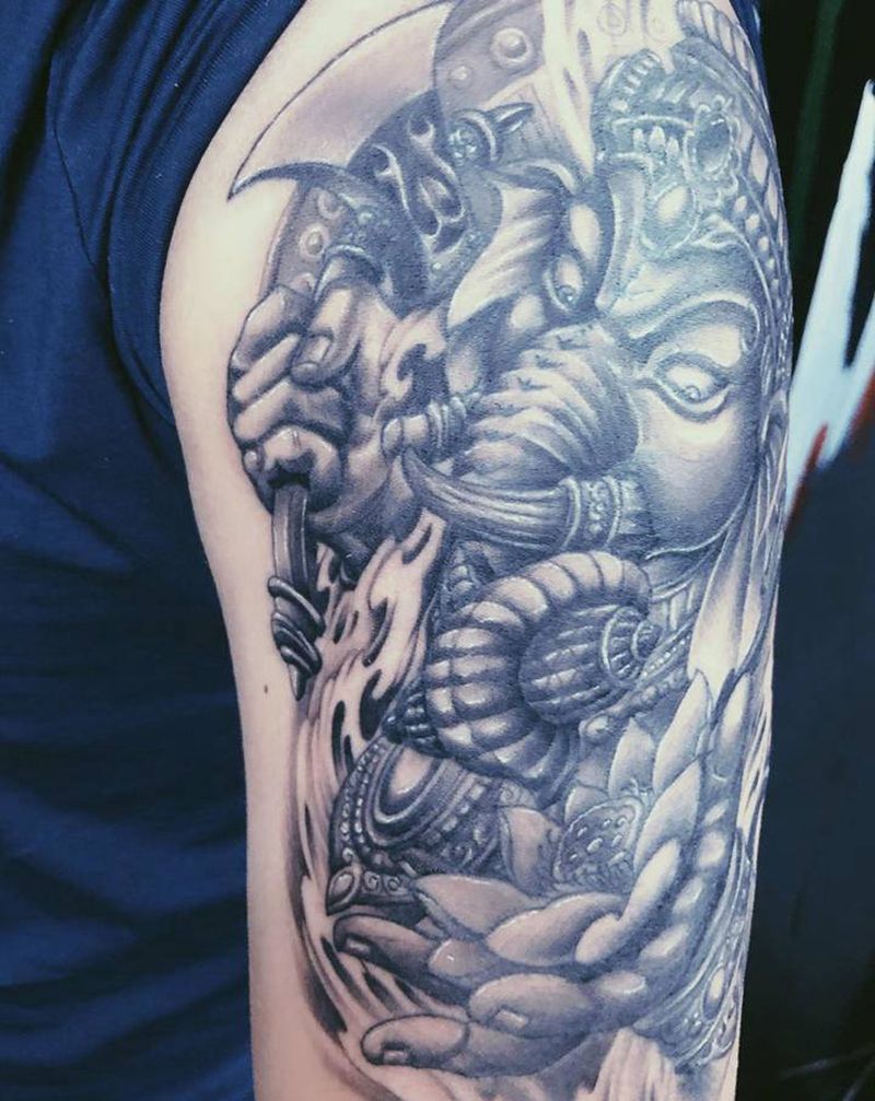 大臂象神纹身图片_手臂新传统纹身图案