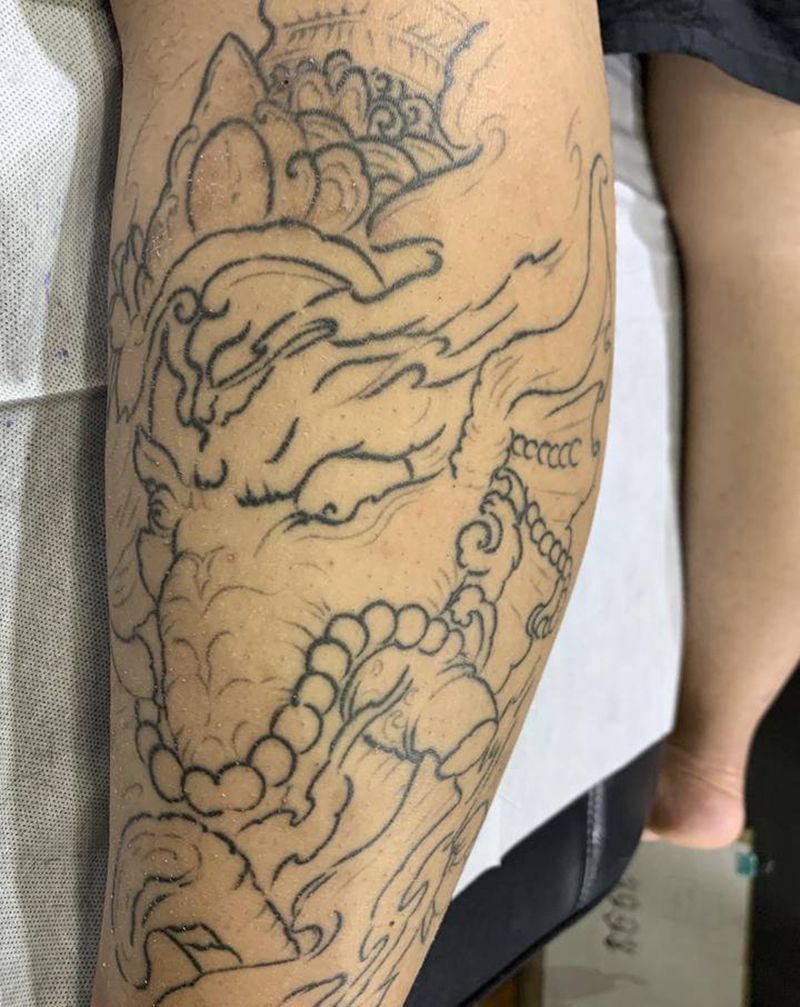 象神修改未完纹身图片_腿部新传统纹身图案