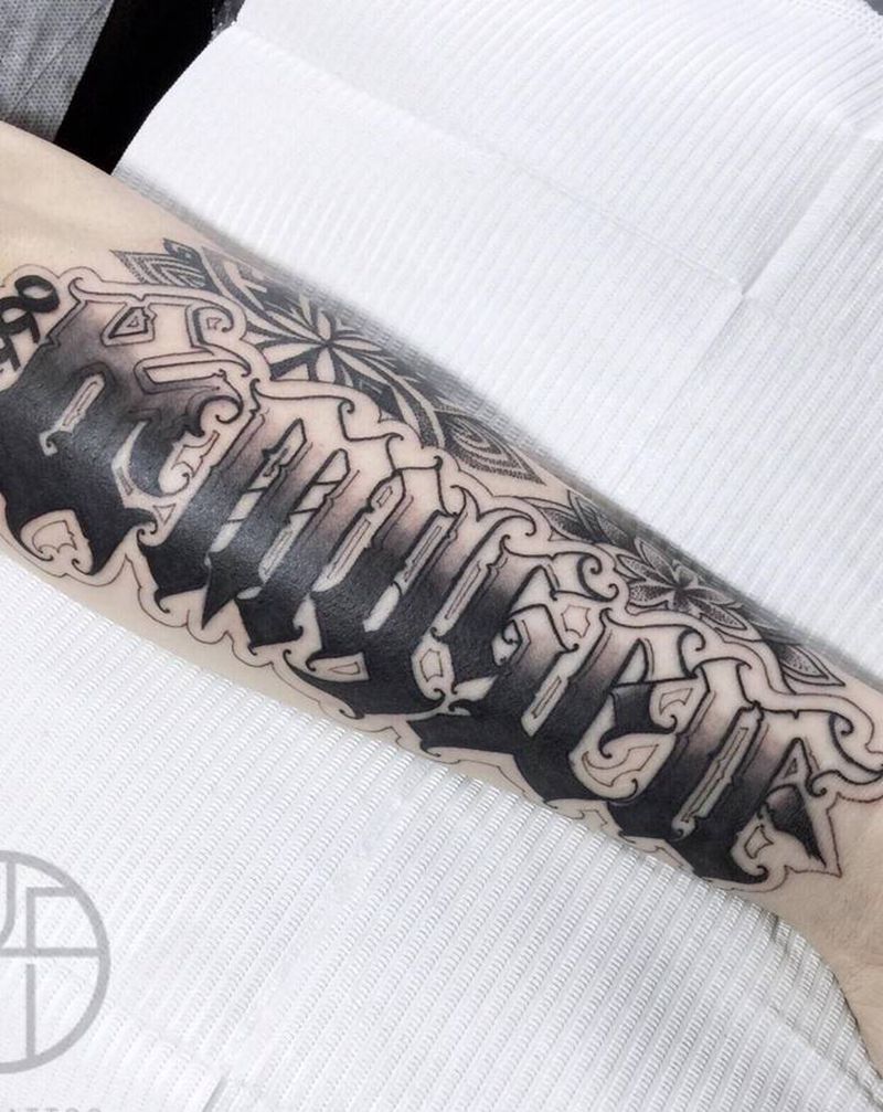 小臂花体纹身图片_手臂纹身图案