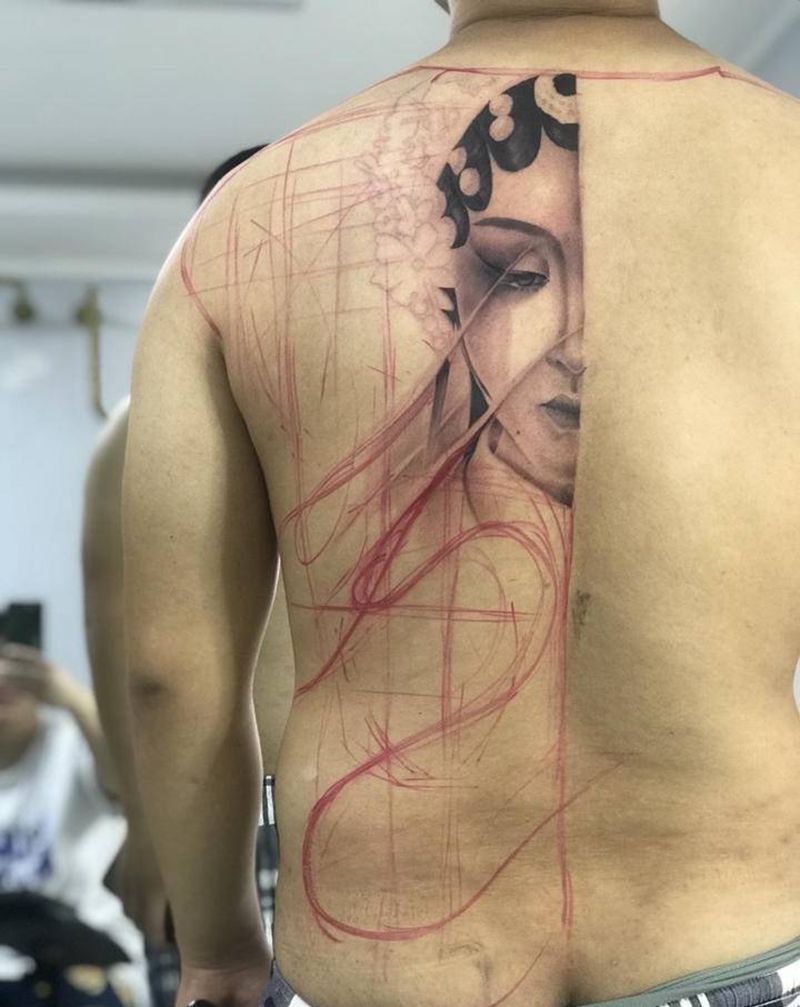 人生如戏纹身图片_背部半背纹身图案