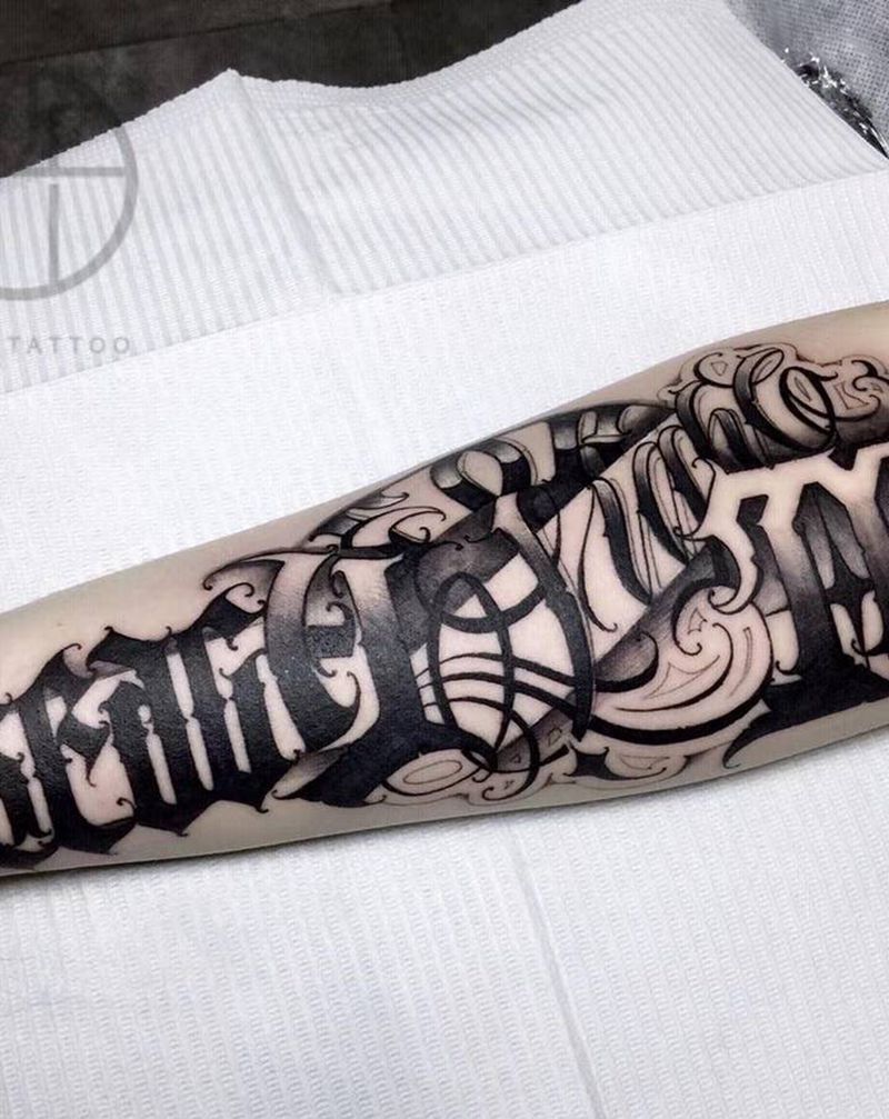 小臂花体字纹身图片_手臂花体字纹身图案