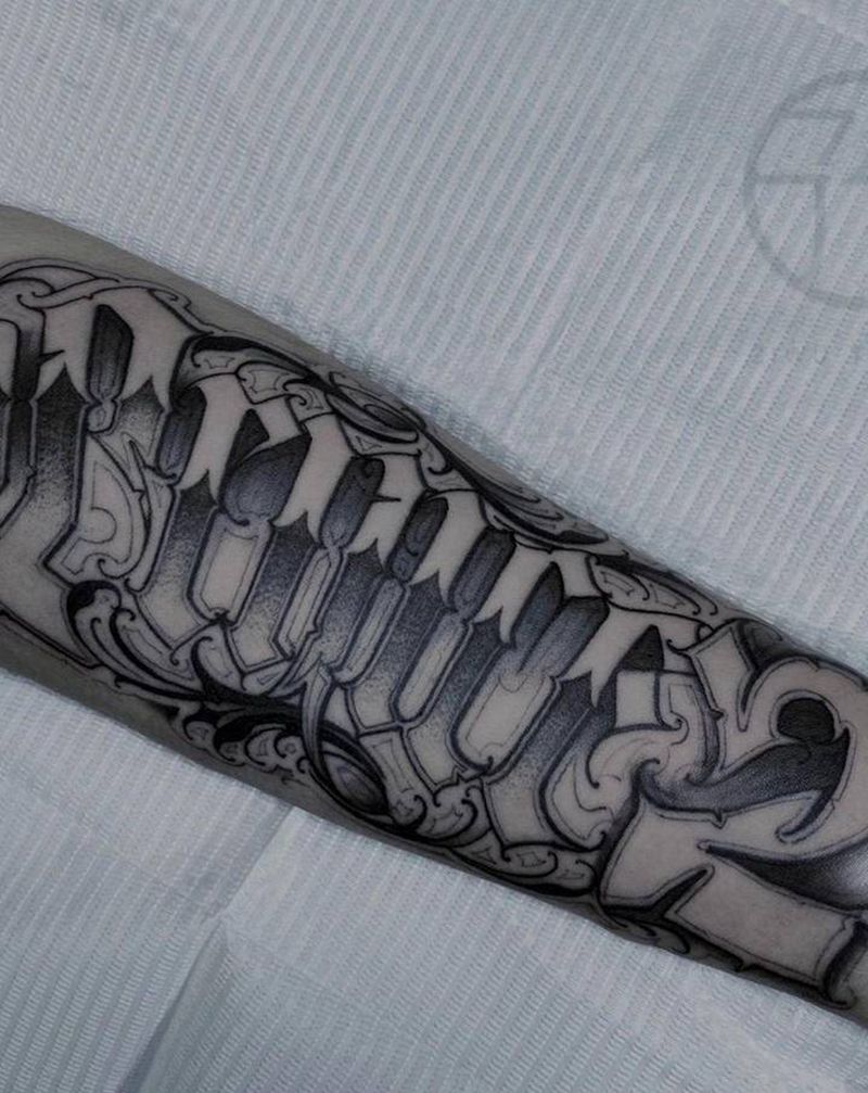 小臂花体纹身图片_花体字纹身图案