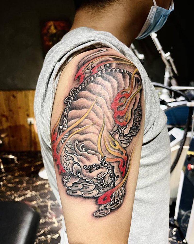 传统神兽纹身图片_手臂腿部老传统纹身图案