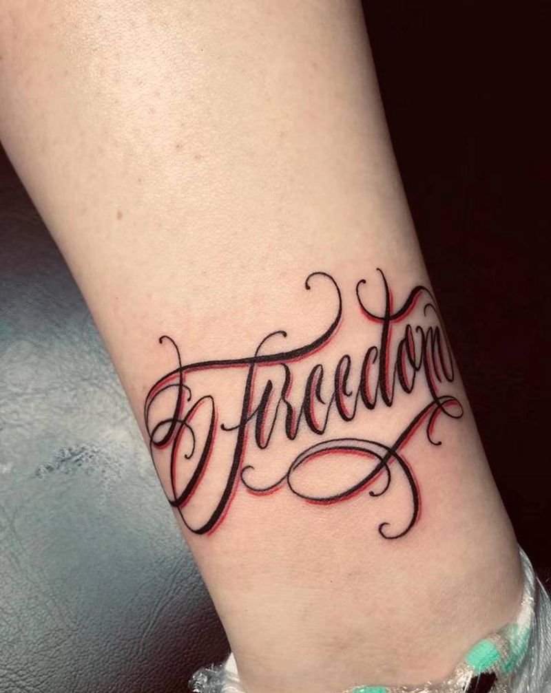 花体字纹身图片_腿部花体字纹身图案