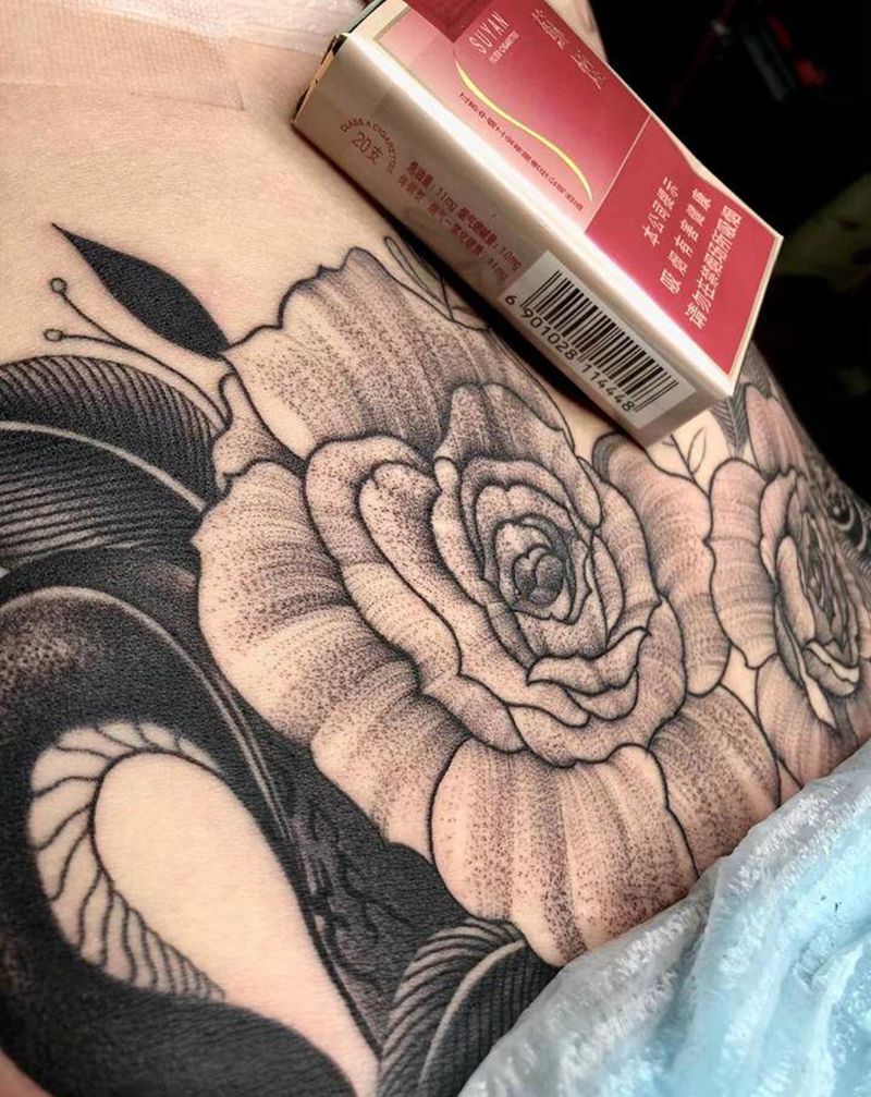 素花遮盖纹身图片_腹部点刺纹身图案