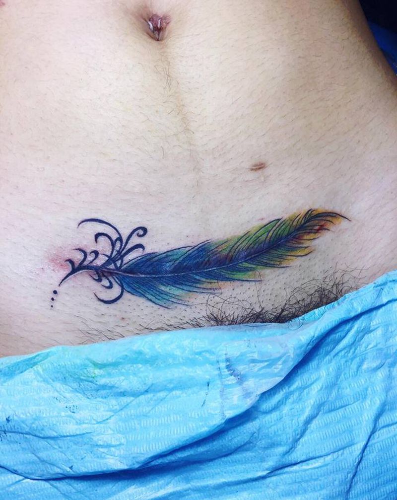 羽毛剖腹产疤痕遮盖纹身图片_腹部水彩纹身图案