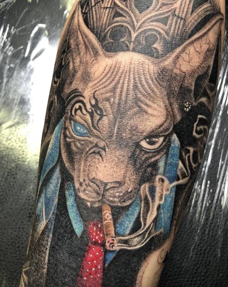 猫未完纹身图片_手臂点刺纹身图案