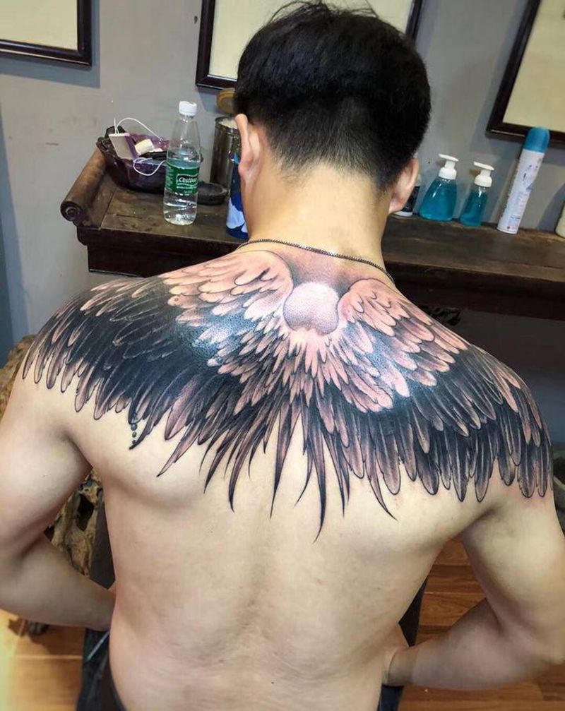 后背羽冀纹身图片_背部新传统纹身图案