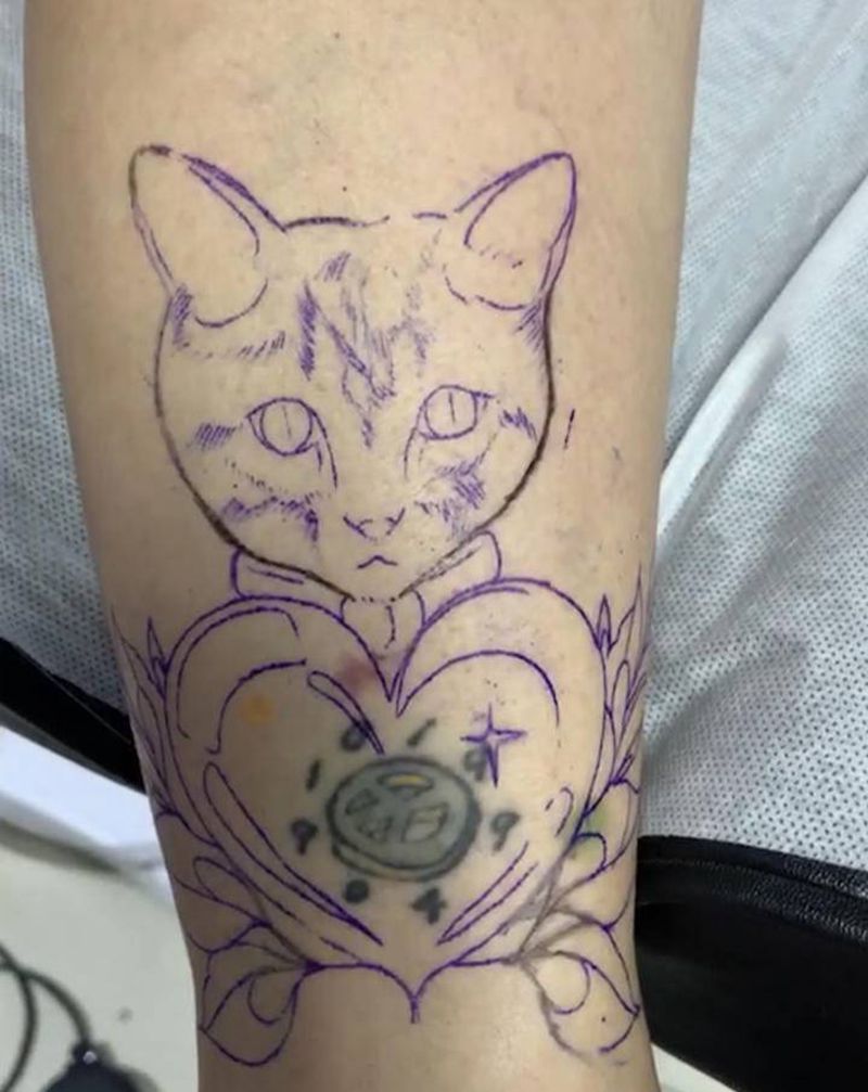 遮盖未完纹身图片_腿部纹身图案