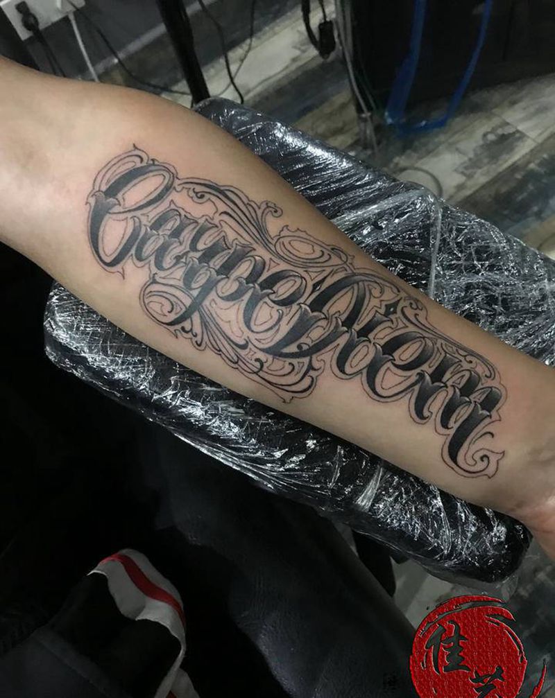 奇卡诺纹身图片_手臂花体字纹身图案