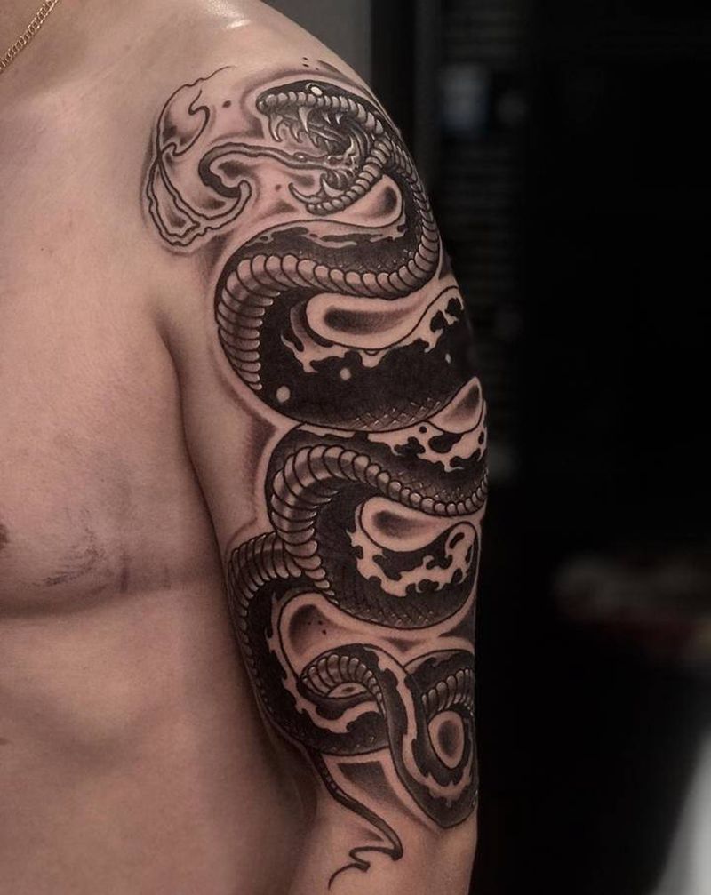 蛇臂纹身图片_手臂新传统纹身图案