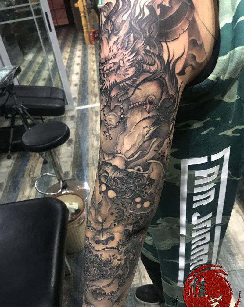 啥人物的，忘得了好像纹身图片_手臂新传统纹身图案