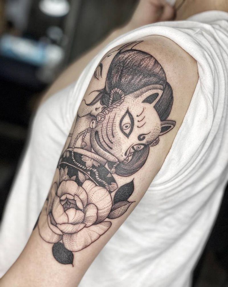 素花面具纹身图片_手臂点刺纹身图案