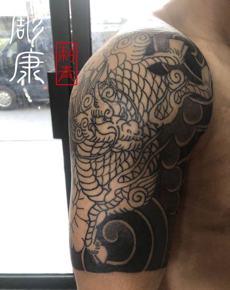 老传统 麒麟纹身图片_手臂老传统纹身图案